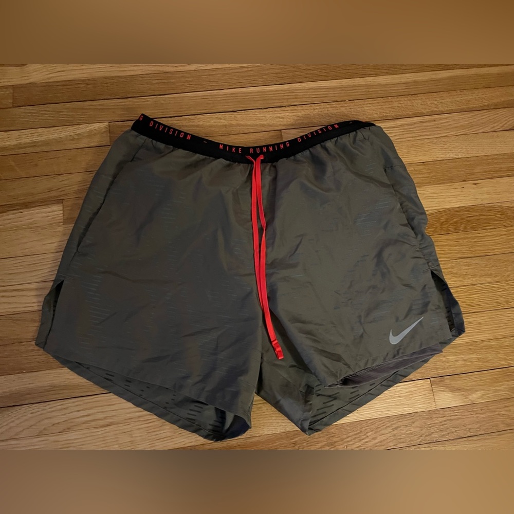 5” inseam Nike running shorts worn once with 3M reflective patter, light tan